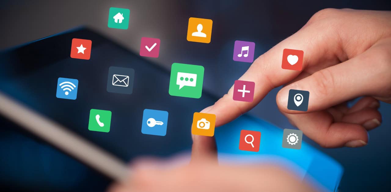 A finger touches a tablet screen surrounded by floating colorful app icons, representing app privacy and data access.