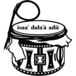 Black and white illustration of a decorated drum with a stick resting on top and the text “ísaa’ dala’á adíí” above it.